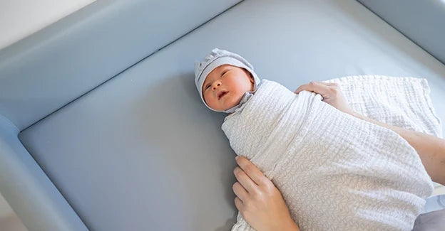 Baby Swaddle vs Blanket: What’s the Difference and When To Use Each